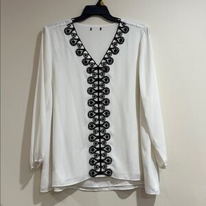 Chic White Blouse with Black Detailing